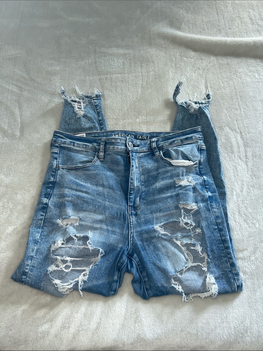 American Eagle Outfitters Women’s Super High Rise Light Blue Ripped Skinny Jeans